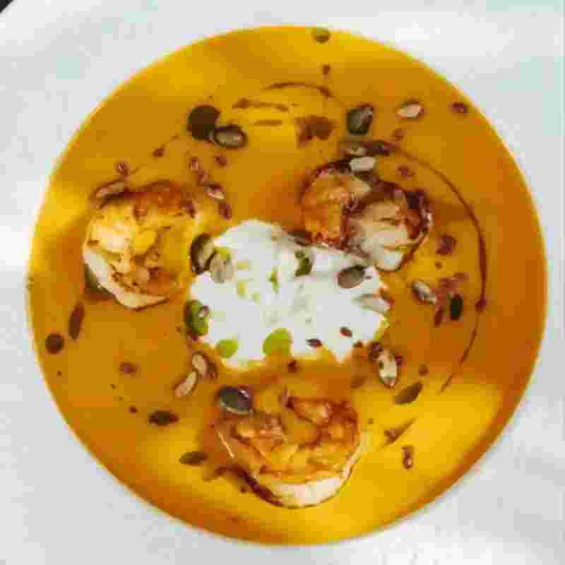 creamy-pumpkin-soup-with-stracciatella-and-shrimps.webp