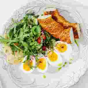 two-eggs-any-style-with-fresh-vegetables-and-herbs.webp