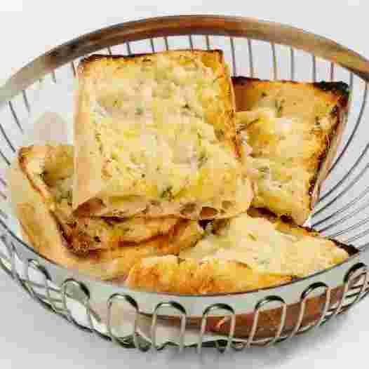 garlic-bread-with-butter-and-parmesan.webp