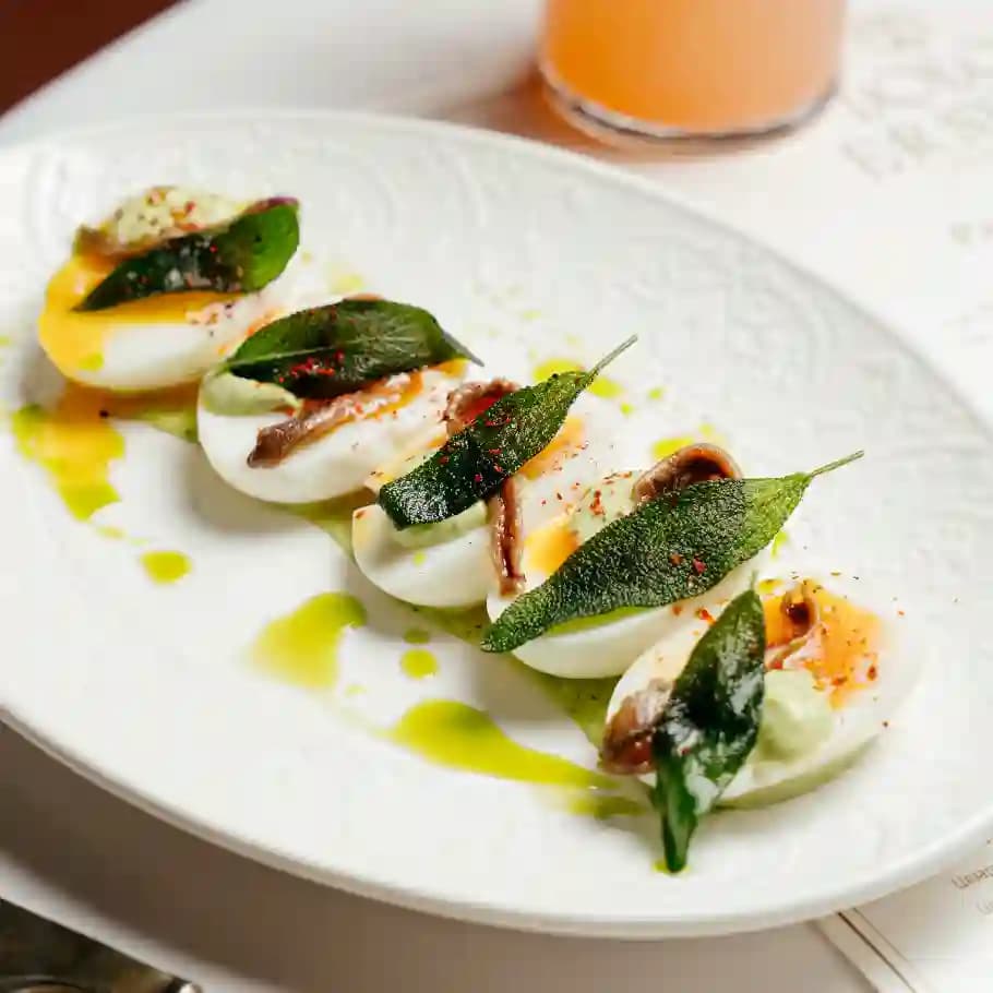 meals/20260721104728-hard-boiled-egg-with-anchovies-and-sage.webp