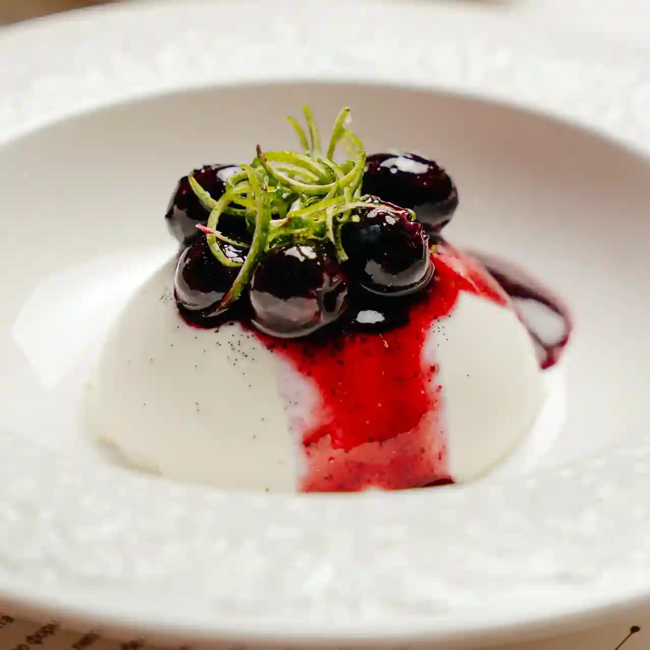 meals/20260721143828-panna-cotta-with-blueberry-jam-and-candied-lime.webp